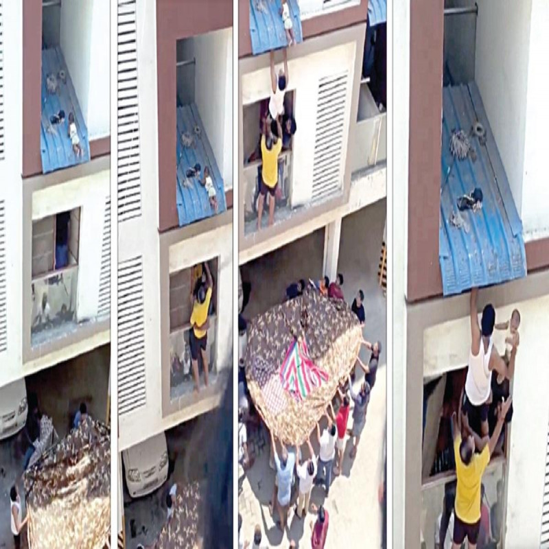 people-safely-rescued-the-child-hanging-from-the-roof-of-the-apartment!