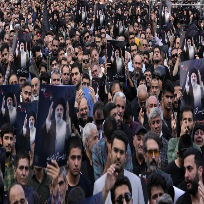 iran's-presidential-election-on-june-28:-thousands-pay-tribute-to-raisi's-body